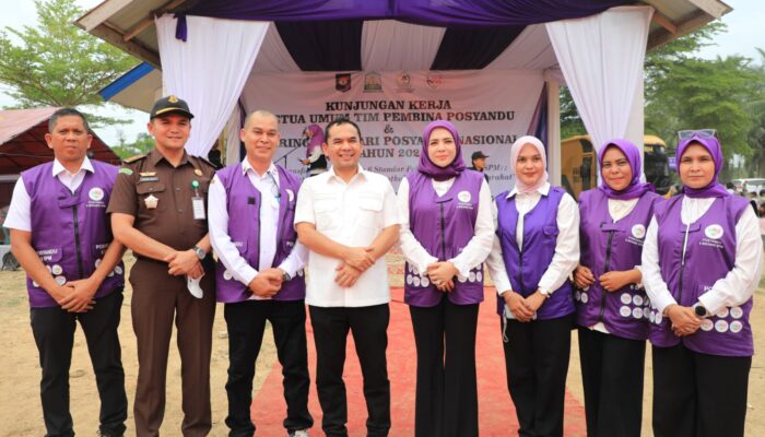 Ketua Tim Pembina Posyandu Kota Lhokseumawe Yulinda Sayuti Dorong Percepatan Implementasi 6 SPM
